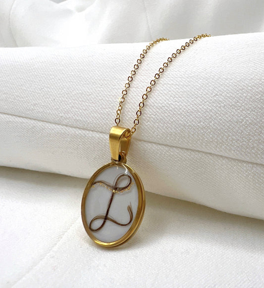 Erinnerungsschmuck mit Haaren als Buchstabe, Oval