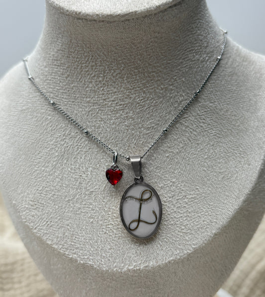 Halskette mit Haaren als Buchstabe, Oval mit Anhänger