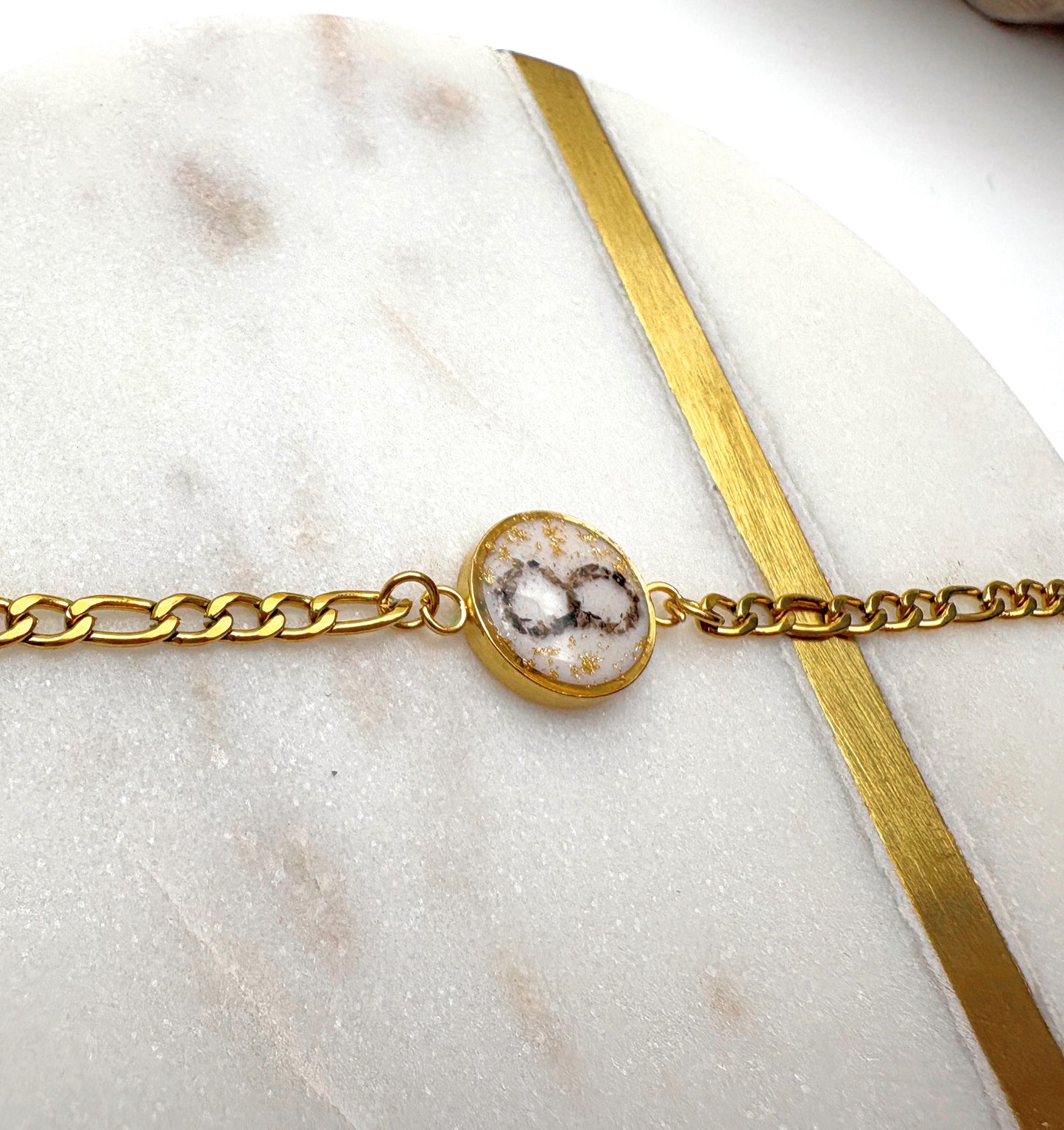 Stahl Armkette mit Tierkralle oder Nabelschnur als Infinty